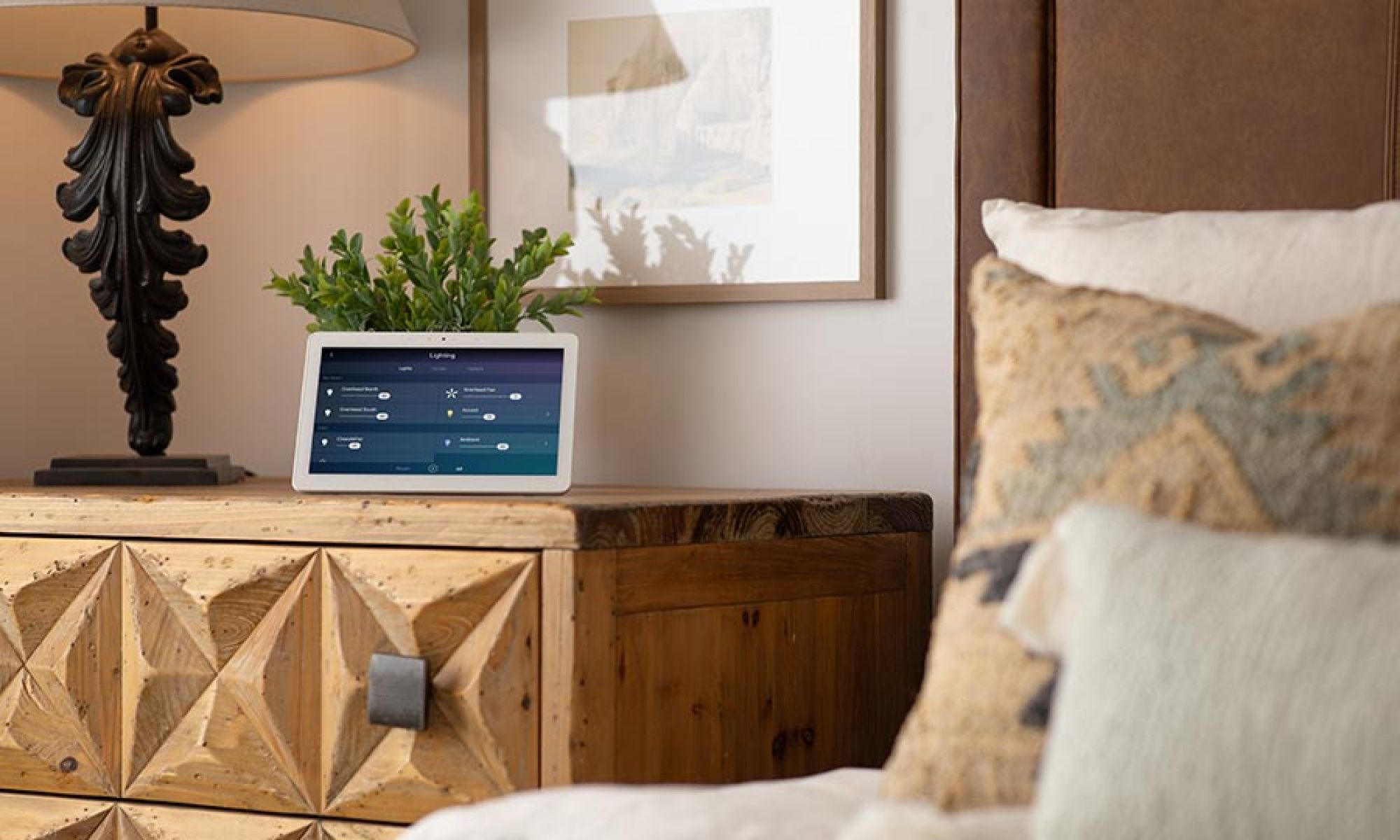Smart home touch screen interface on a wooden nightstand