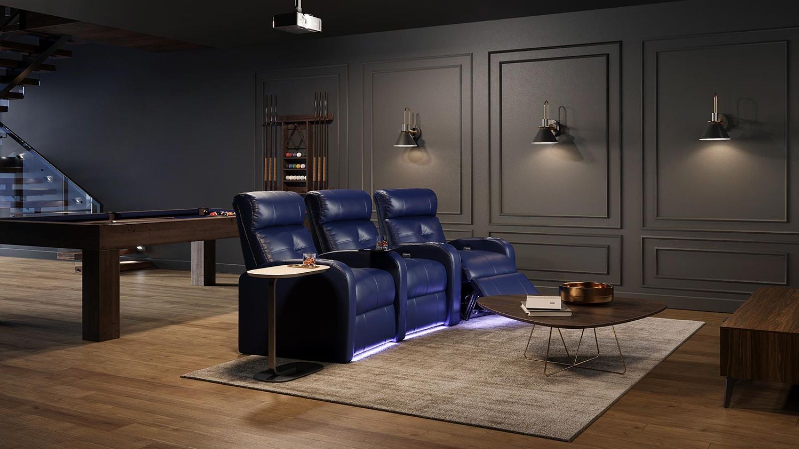 three blue leather theater seats beside a pool table