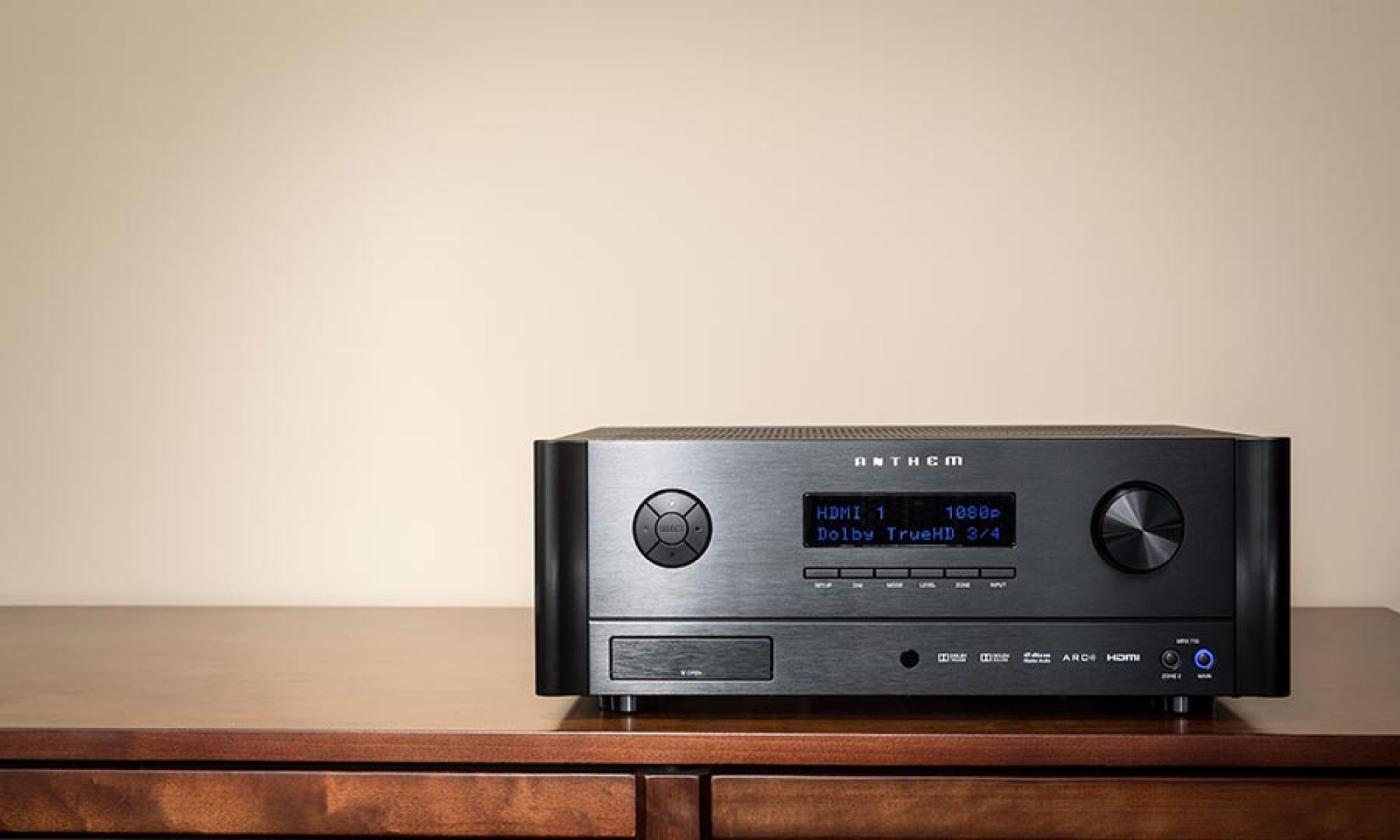 Black audio receiver on a wooden table