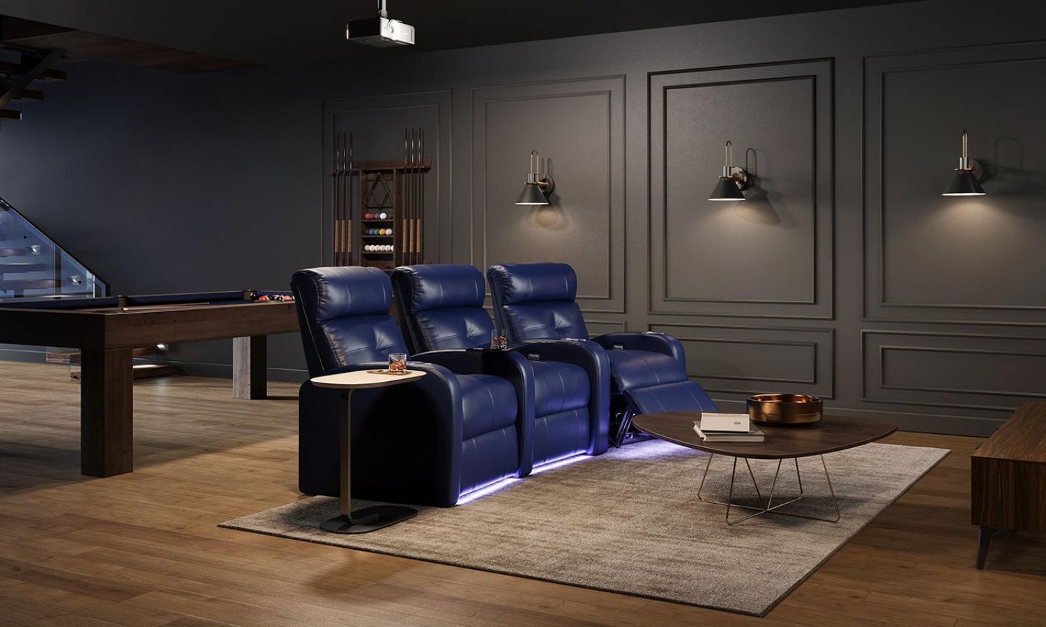 three black leather theater seats in a living room